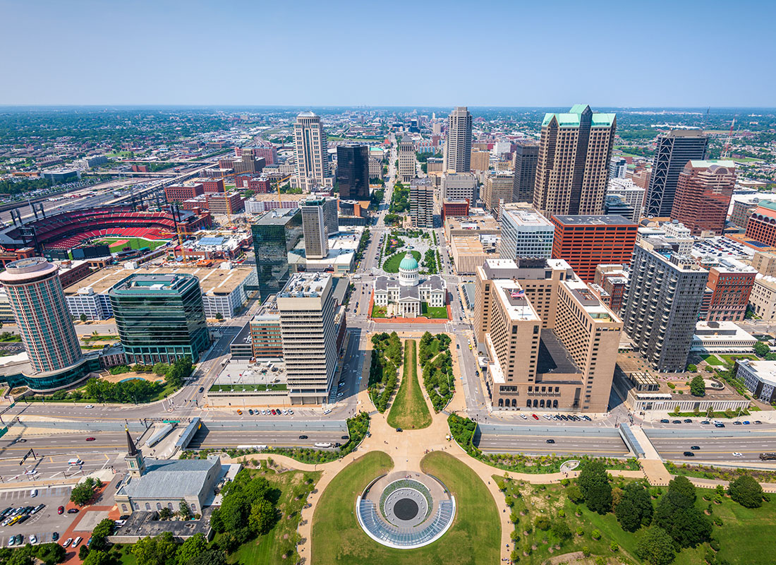 Contact - Aerial View of St. Louis, Missouri Displaying Many Buildings on a Sunny Day